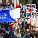 An EU flag waves at the London protests.